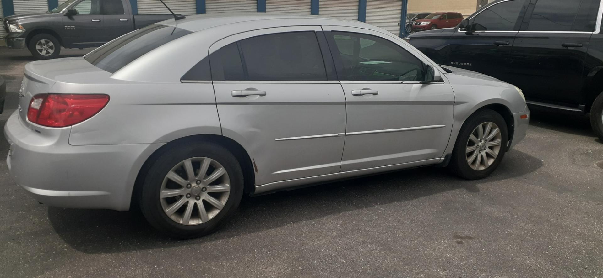 2010 Chrysler Sebring Sedan Limited (1C3CC5FB5AN) with an 2.4L L4 DOHC 16V engine, 4-Speed Automatic transmission, located at 2015 Cambell Street, Rapid City, SD, 57701, (605) 342-8326, 44.066433, -103.191772 - Photo#2